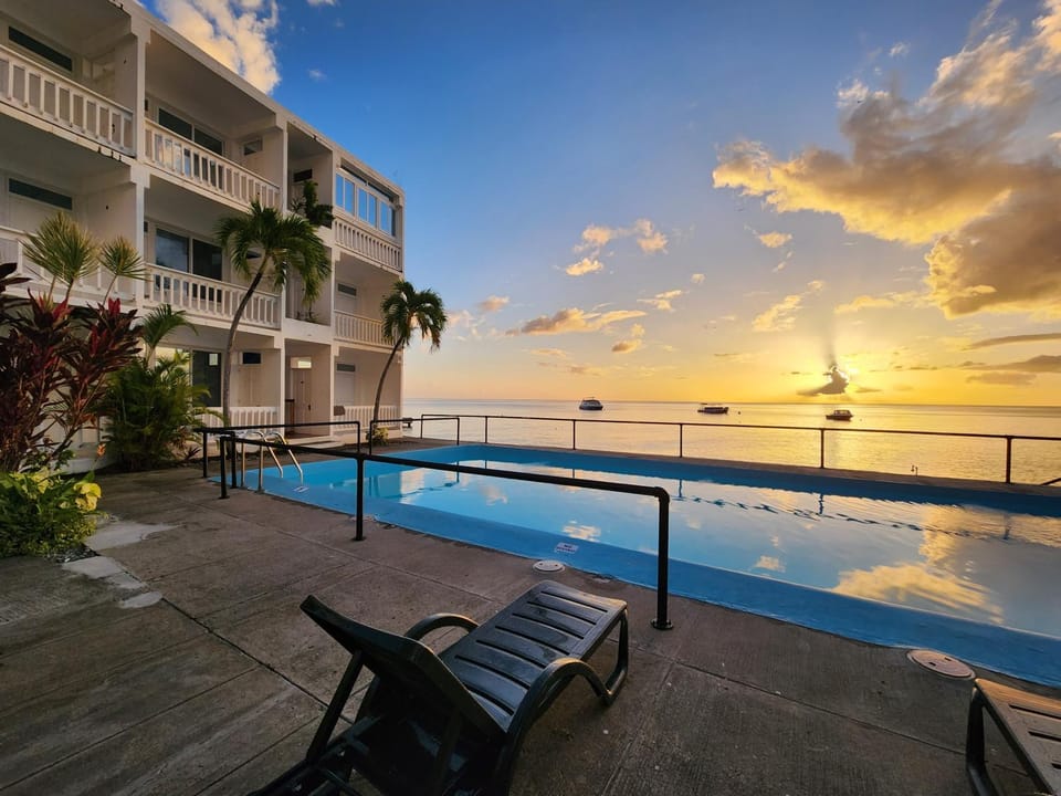 Property building, Swimming pool, Swimming pool, Sunset