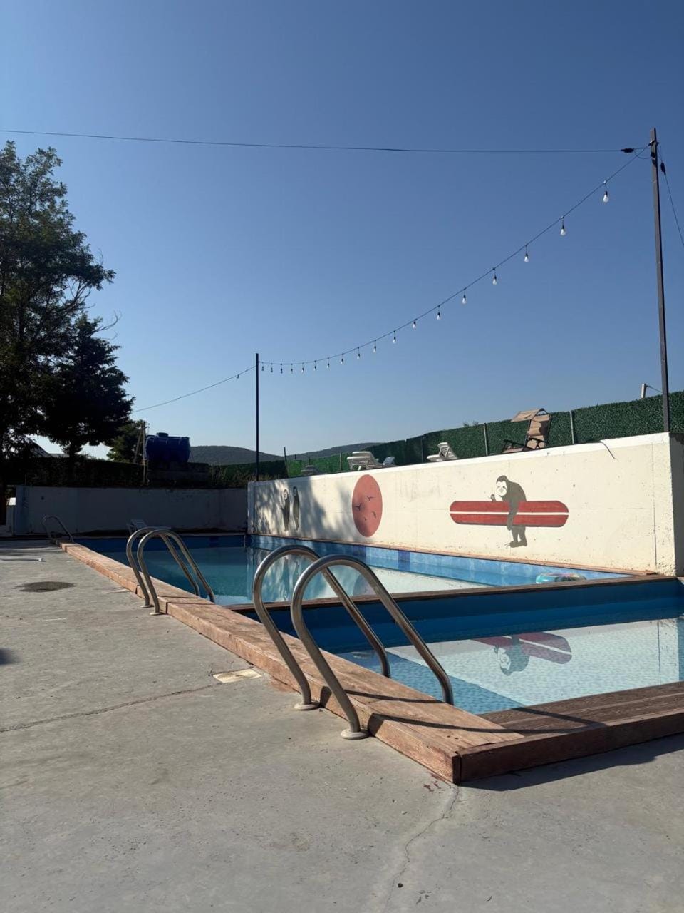 Swimming pool, sunbed