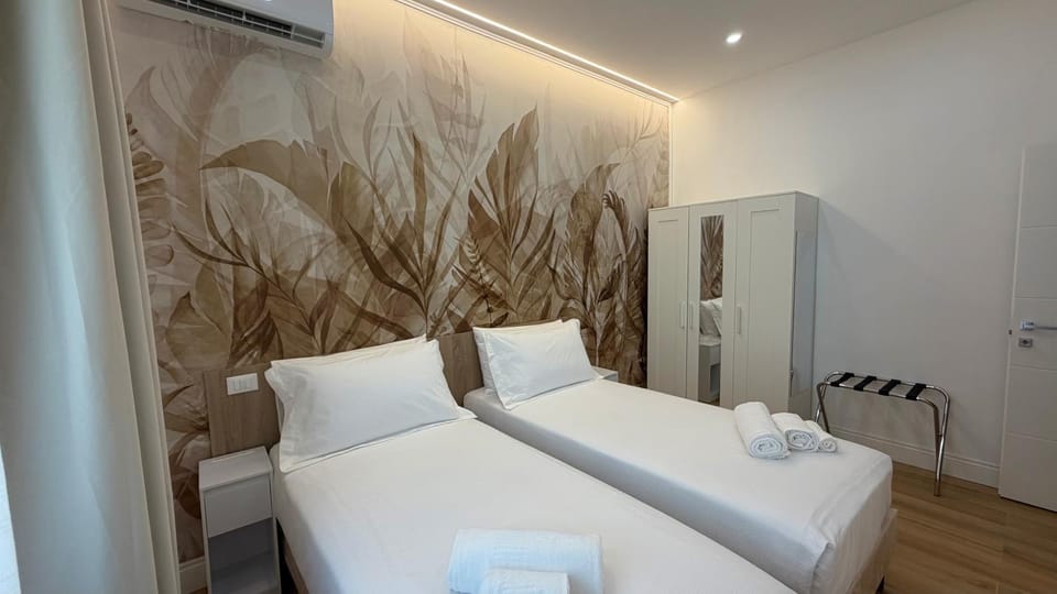Bed, Photo of the whole room, Bedroom, towels, air conditioner