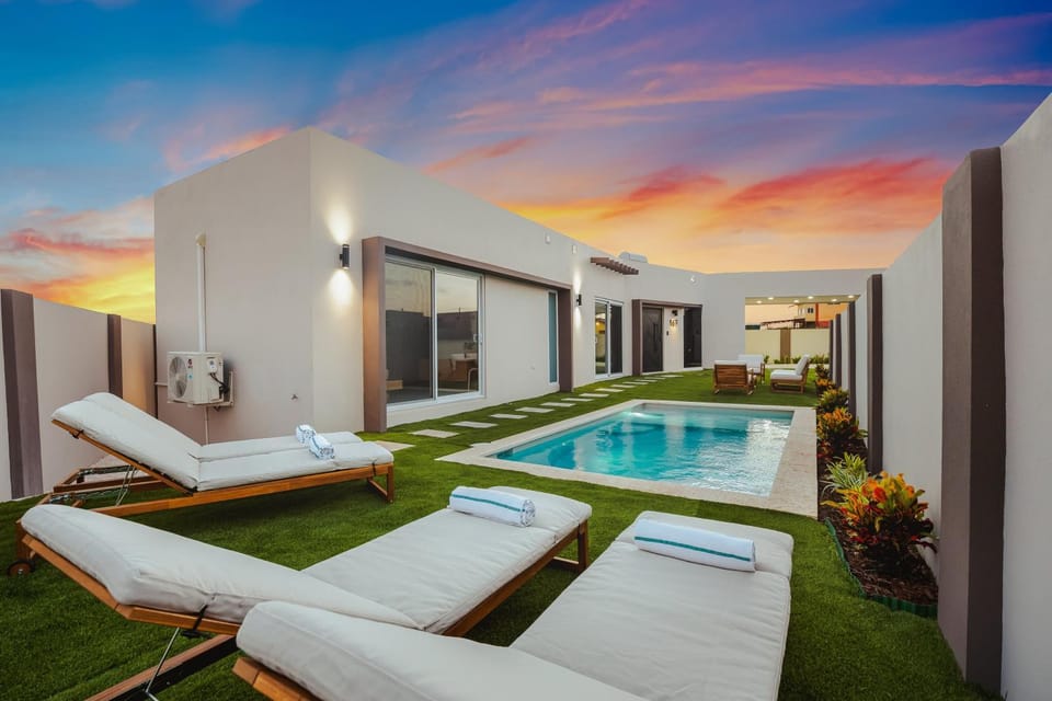 Swimming pool, Sunset, Inner courtyard view, sunbed