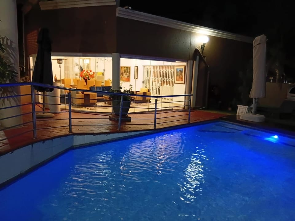 Property building, Night, Pool view, Swimming pool