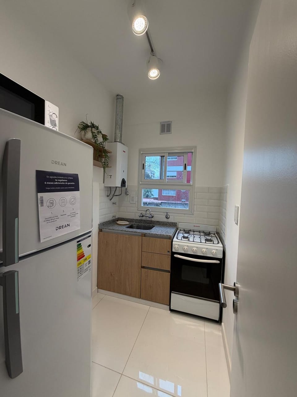 Kitchen or kitchenette, oven