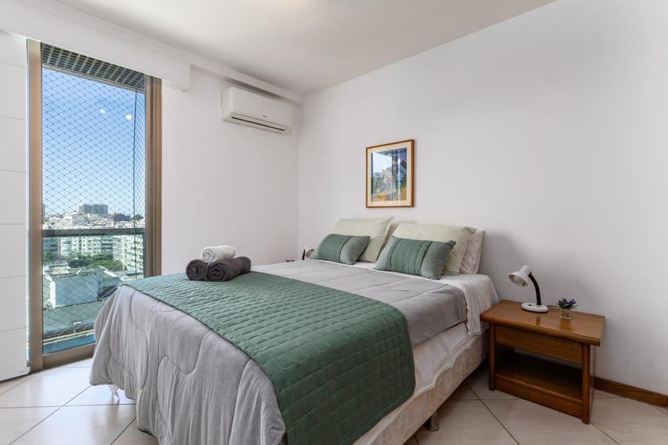 Bed, Photo of the whole room, Bedroom, towels, air conditioner
