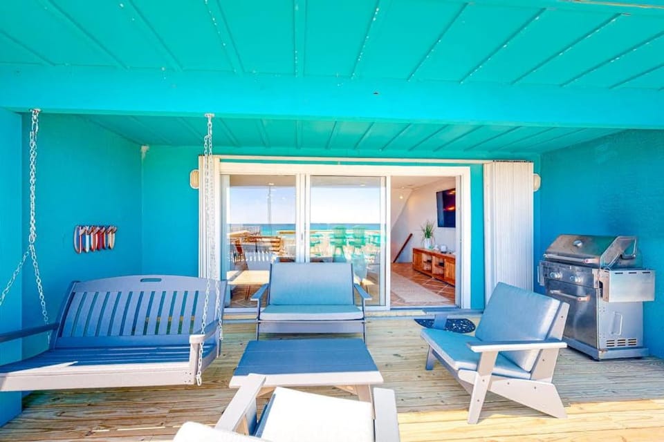 Three-Story Beachfront Gem with a Private Balcony Ocean View & Full Kitchen House in Pensacola Beach