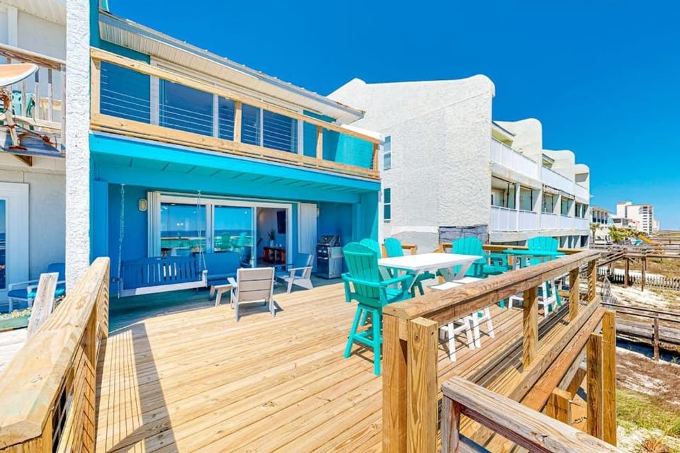 Three-Story Beachfront Gem with a Private Balcony Ocean View & Full Kitchen House in Pensacola Beach