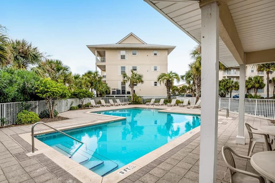 Sunny coastal condo with pool balcony & sound view - walk to the beach House in Pensacola Beach