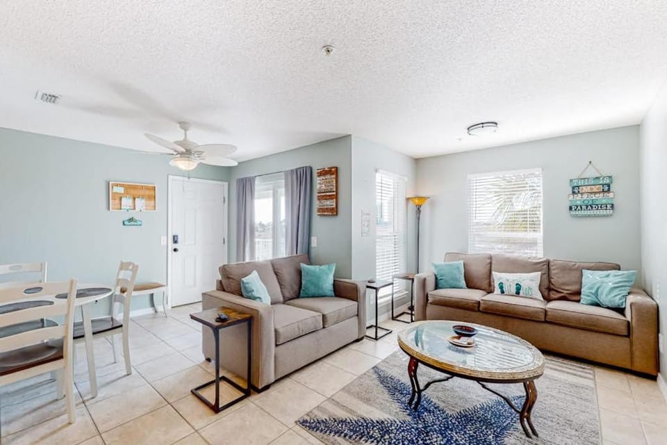 Sunny coastal condo with pool balcony & sound view - walk to the beach House in Pensacola Beach