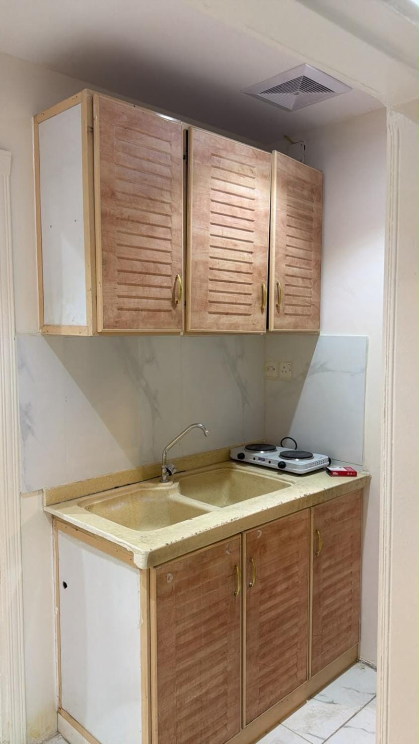 Kitchen or kitchenette, stove