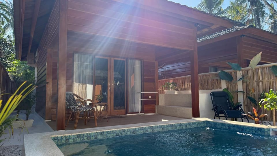 Property building, Day, Natural landscape, Pool view, Swimming pool, sunbed