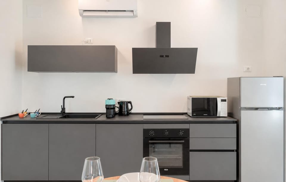 Kitchen or kitchenette, oven, stove
