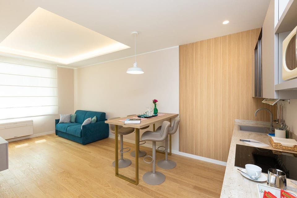 Kitchen or kitchenette, Living room, Seating area, Dining area
