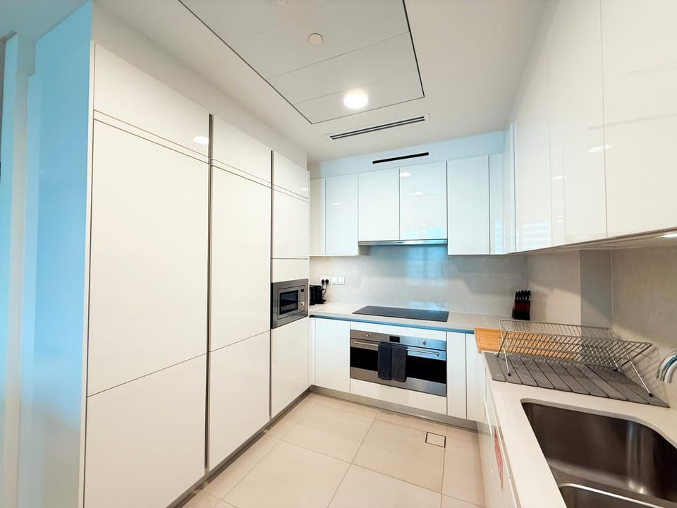 Kitchen or kitchenette, dishwasher, oven, stove, toaster