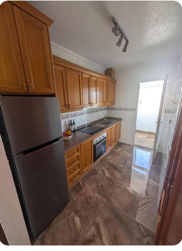 Kitchen or kitchenette, oven