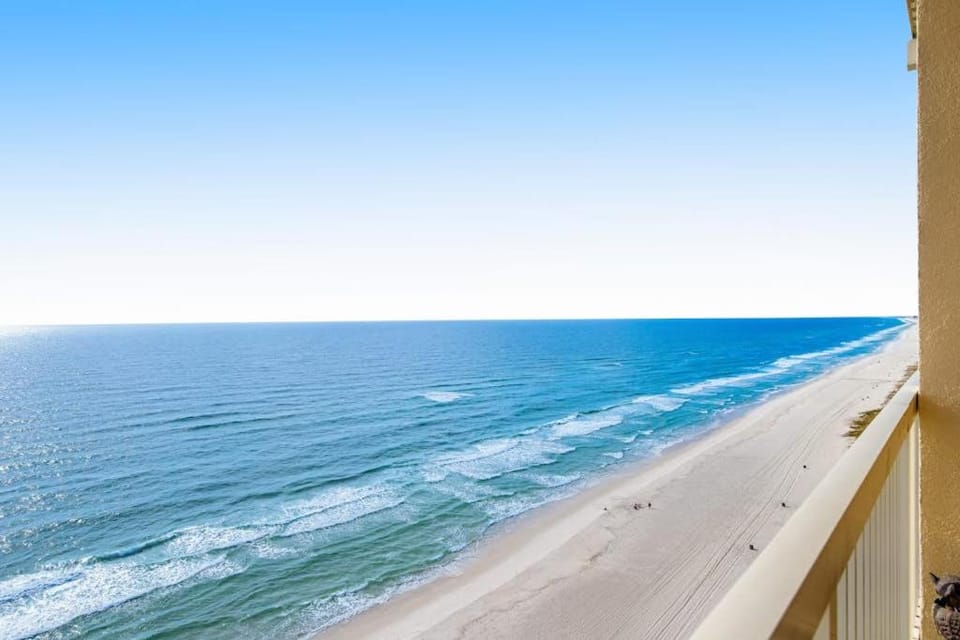 Sunny oceanfront condo with two shared pools hot tub - walk to the beach House in Panama City Beach
