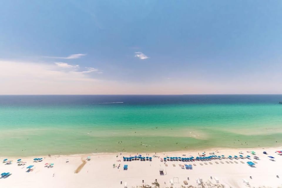 Lovely coastal condo with water views pool hot tub private balcony & WD House in Panama City Beach