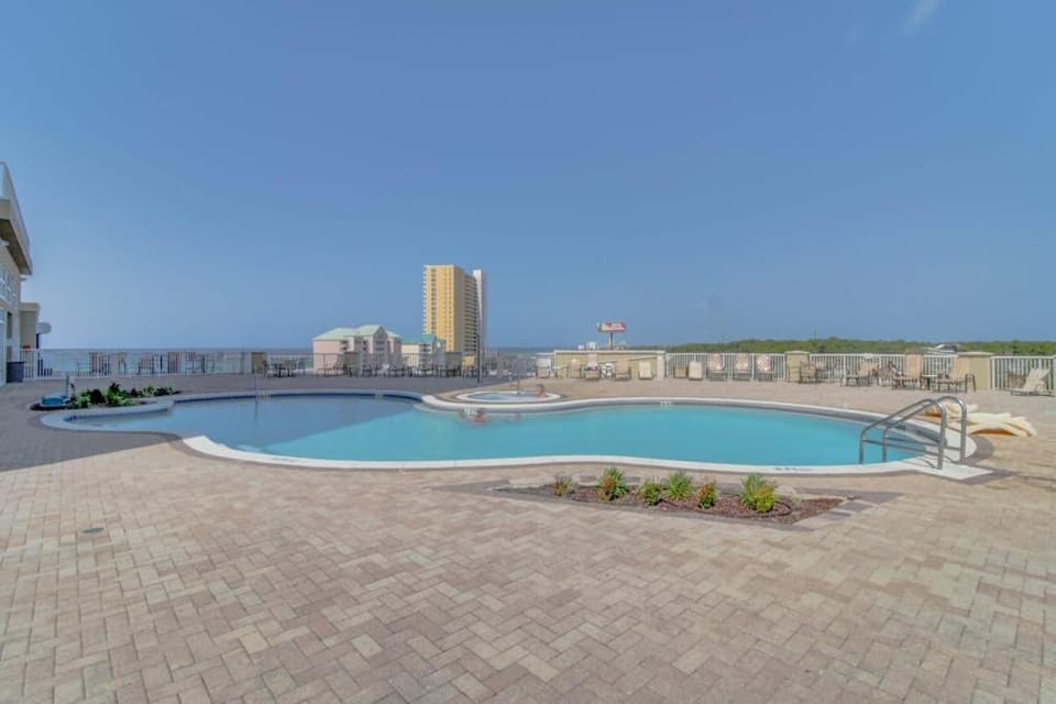 Lovely coastal condo with water views pool hot tub private balcony & WD House in Panama City Beach