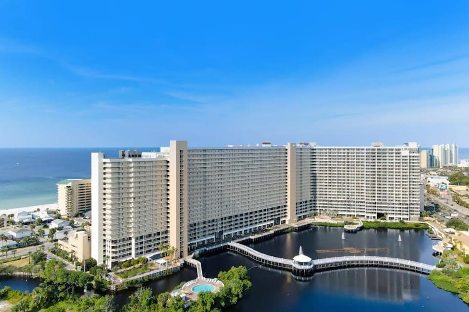 Inviting waterfront condo with pool hot tub beach access balcony & WD House in Panama City Beach