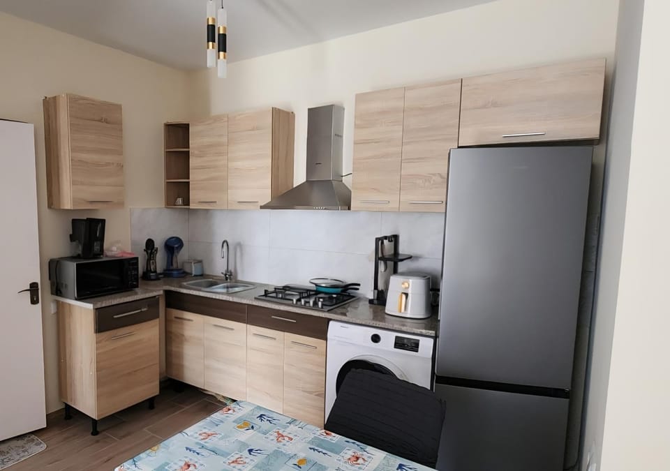 Coffee/tea facilities, Kitchen or kitchenette, microwave, stove, washing machine