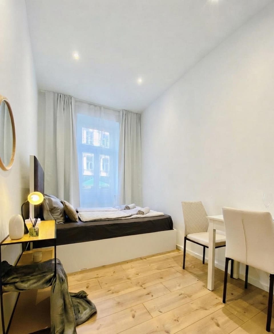 Bed, Seating area, Bedroom