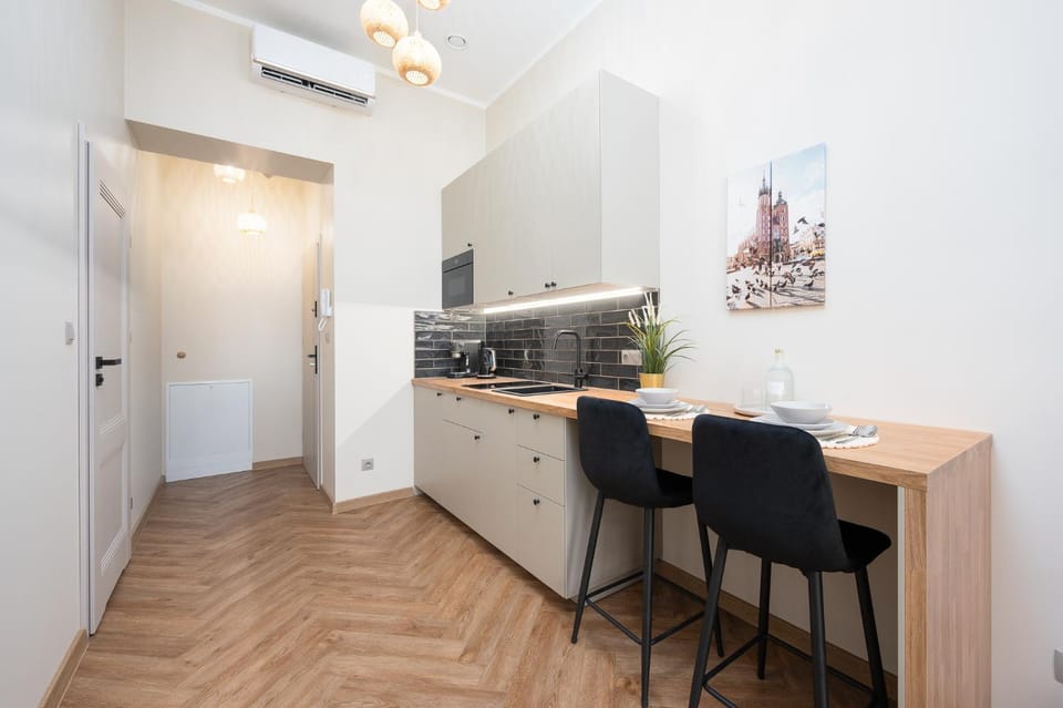 Kitchen or kitchenette, oven, stove, air conditioner