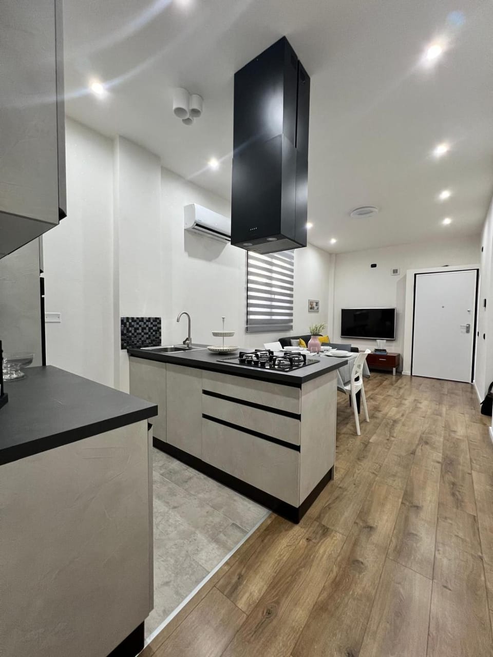 Kitchen or kitchenette, dishwasher, oven, stove