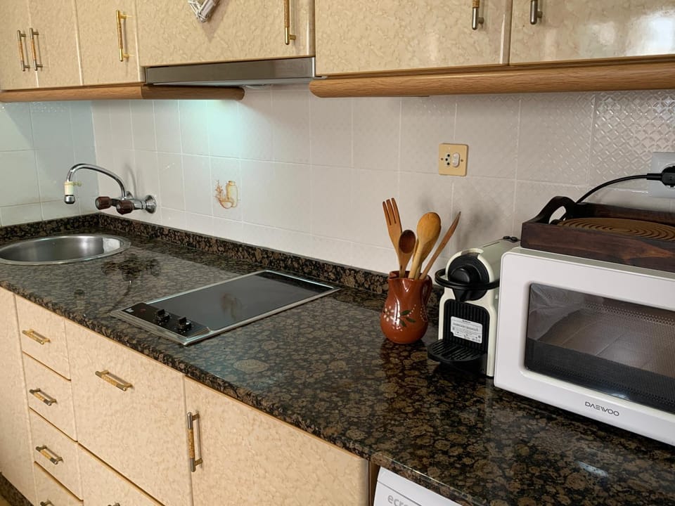 Kitchen or kitchenette, stove