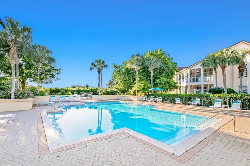 Dog-friendly condo with a shared outdoor pool & fast WiFi - steps from beach House in Miramar Beach