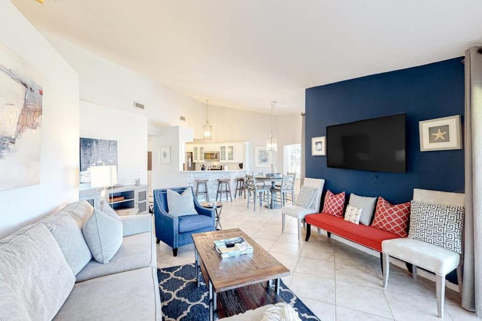 Dog-friendly condo with a shared outdoor pool & fast WiFi - steps from beach House in Miramar Beach