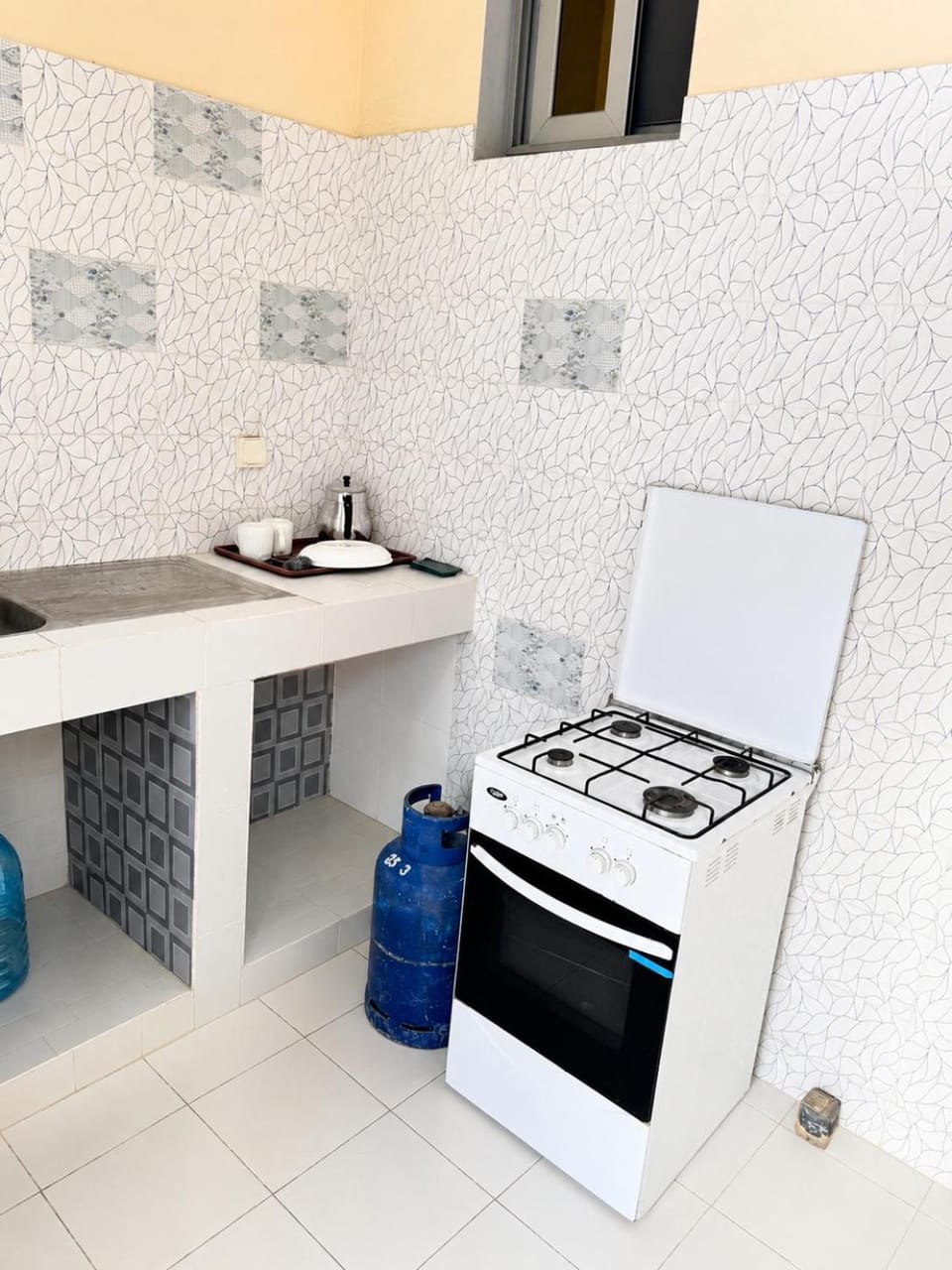 Kitchen or kitchenette, stove
