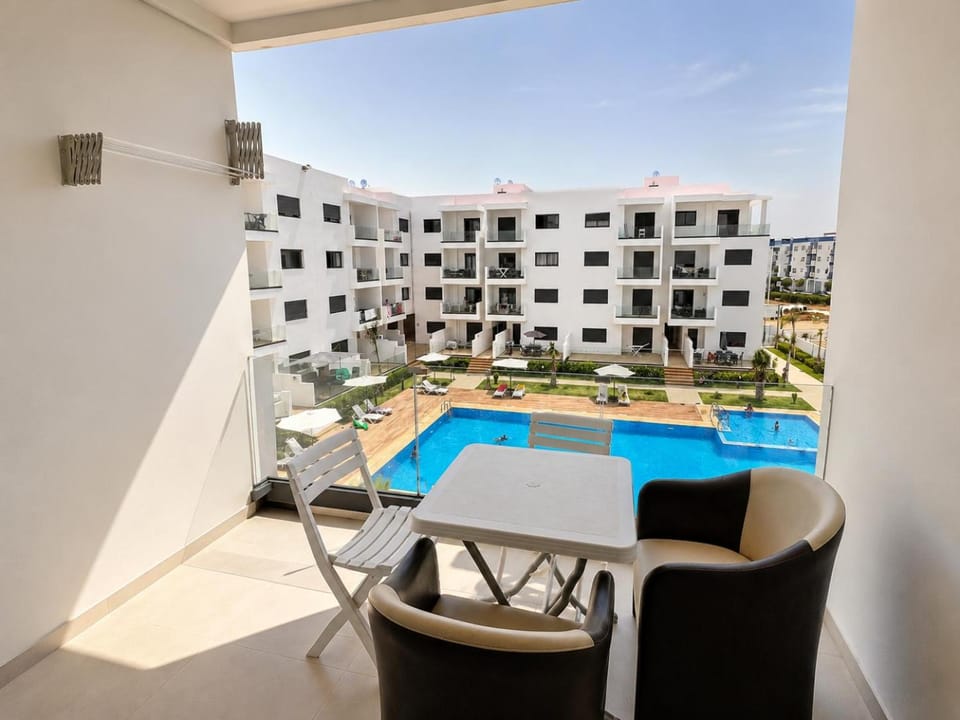 Property building, Patio, Day, View (from property/room), Balcony/Terrace, Dining area, Pool view, Swimming pool, Swimming pool, sunbed