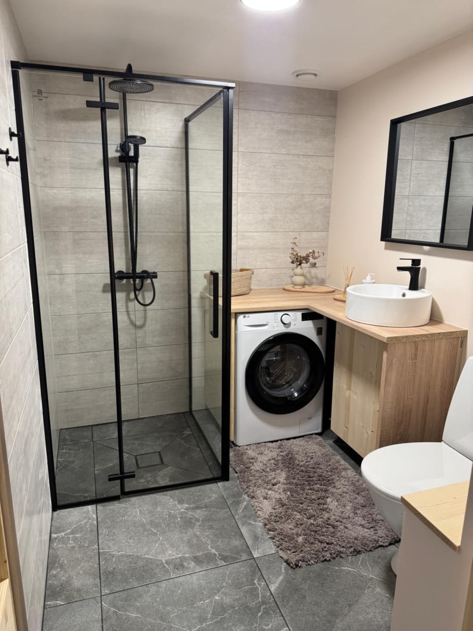 Shower, Toilet, Bathroom, towels, washing machine, dryer