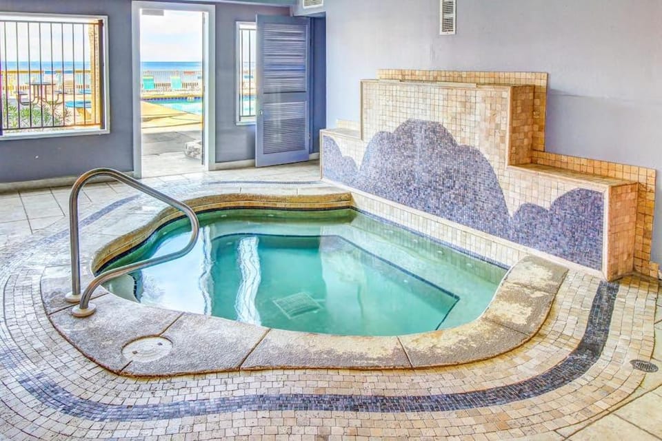 Beachfront Condo gorgeous views shared pool hot tub and beach access House in Lower Grand Lagoon