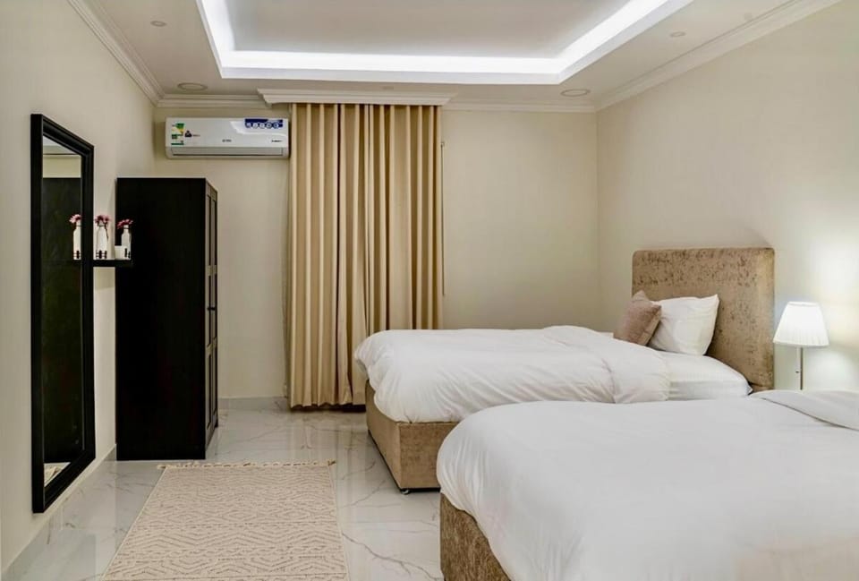 2BR 65 TV Self Check-in Apartment in Al Khobar