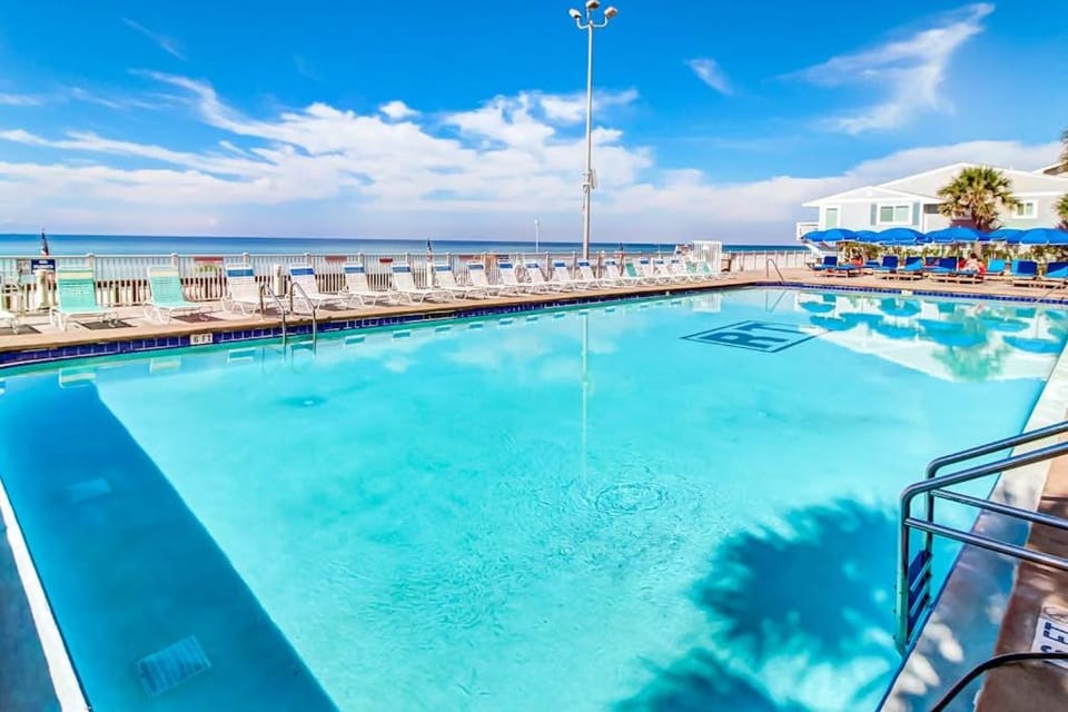 Spacious Gulf front fifth-floor condo with heated saltwater pool & hot tub House in Lower Grand Lagoon