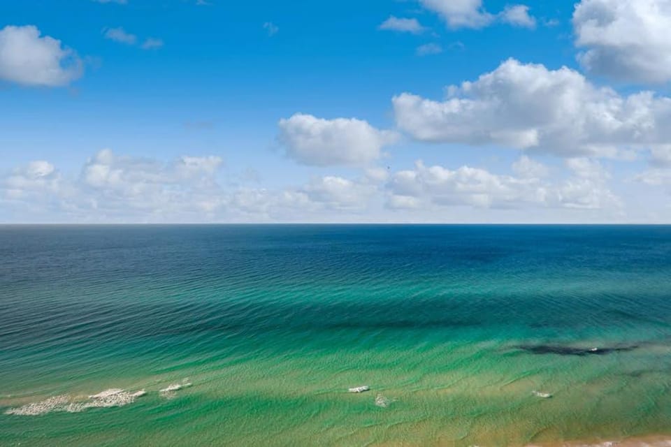 Top-floor penthouse condo with amazing view balcony WD pools gym & hot tub House in Panama City Beach