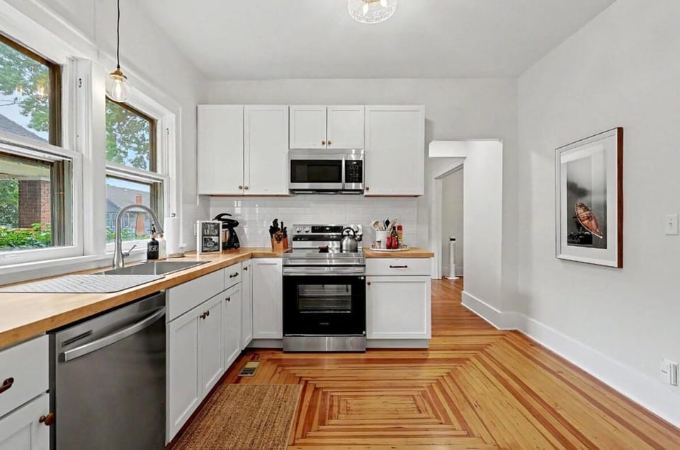 Kitchen or kitchenette, dishwasher, oven, stove, toaster