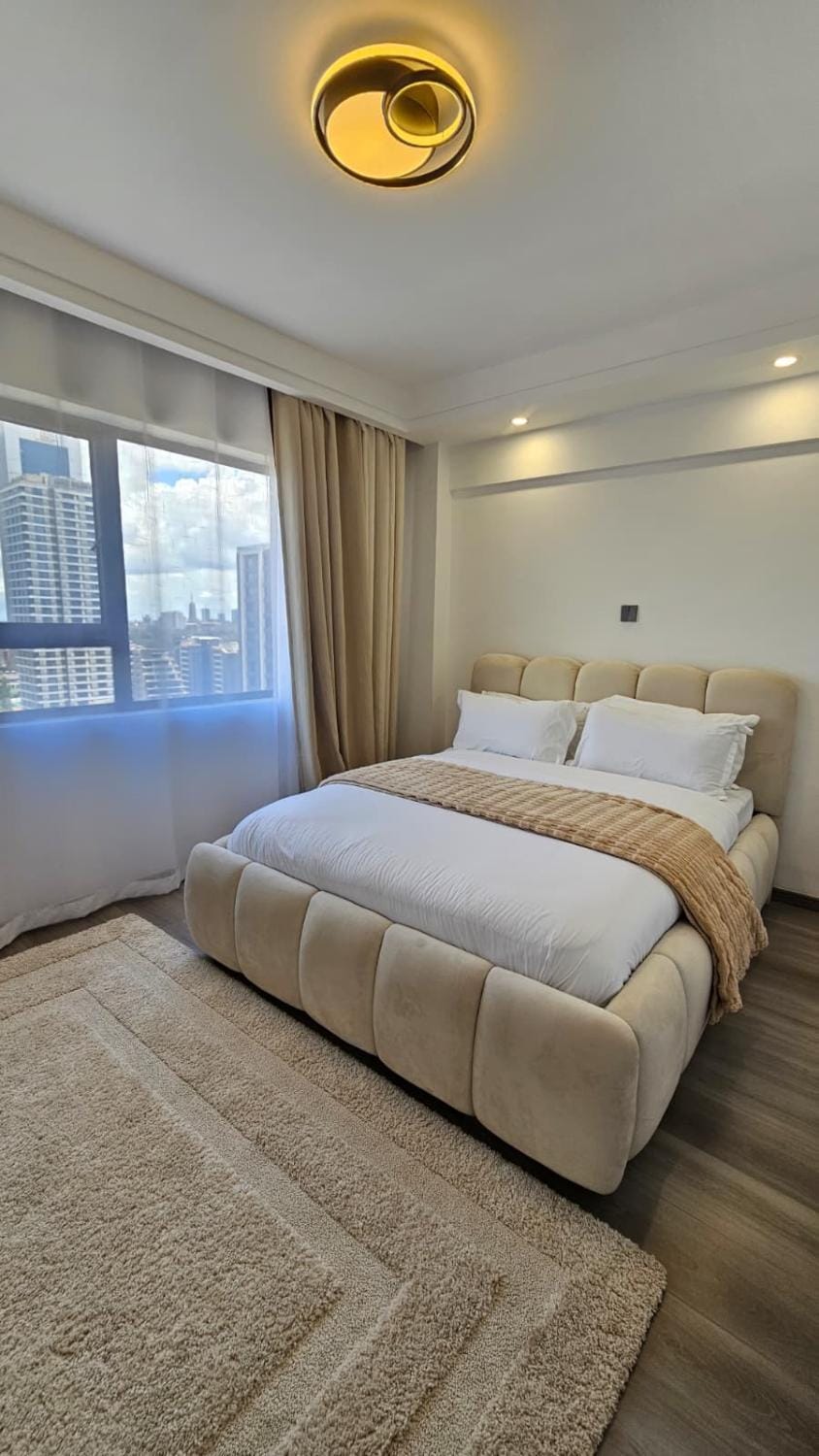 Bed, Living room, Seating area, Bedroom