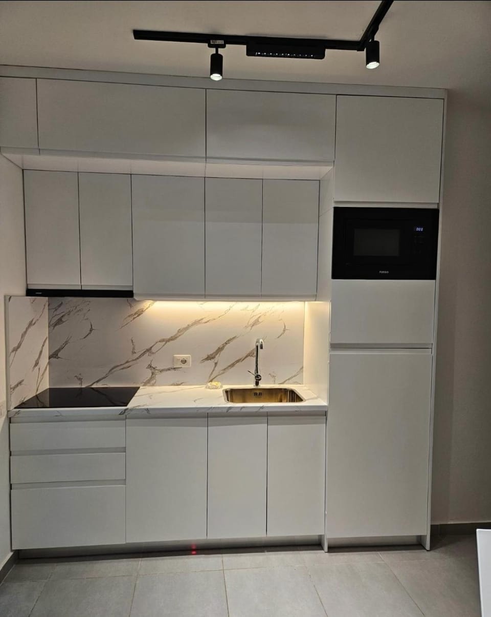 Kitchen or kitchenette, stove