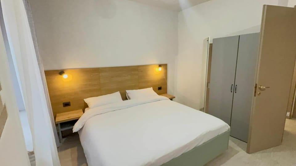 Bed, wardrobe