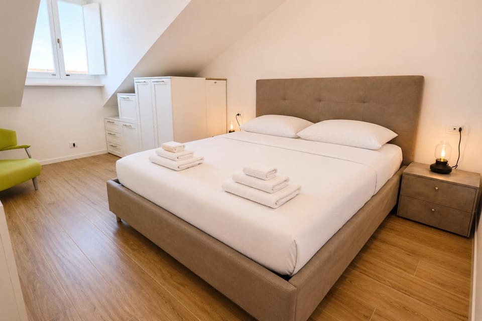 Bed, View (from property/room), Bedroom, locker, towels, wardrobe