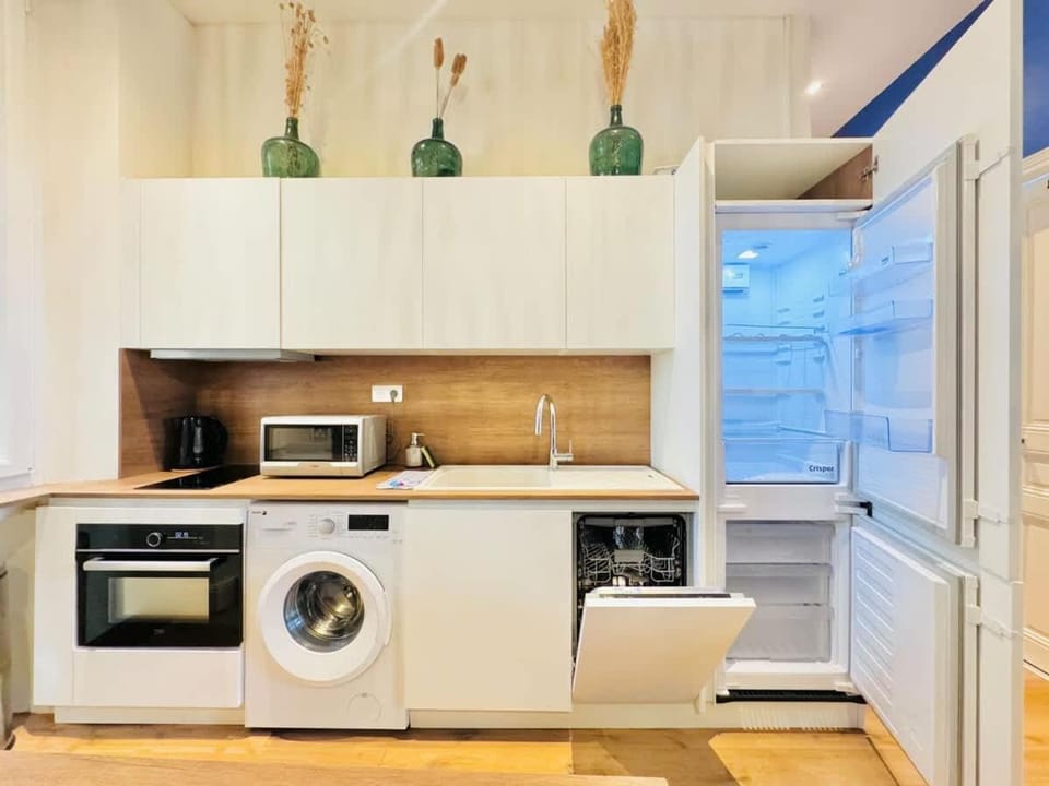 Kitchen or kitchenette, dishwasher, microwave, washing machine