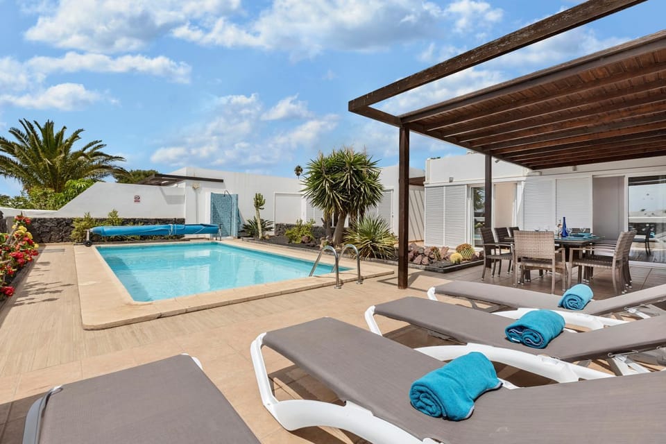Property building, Living room, Swimming pool