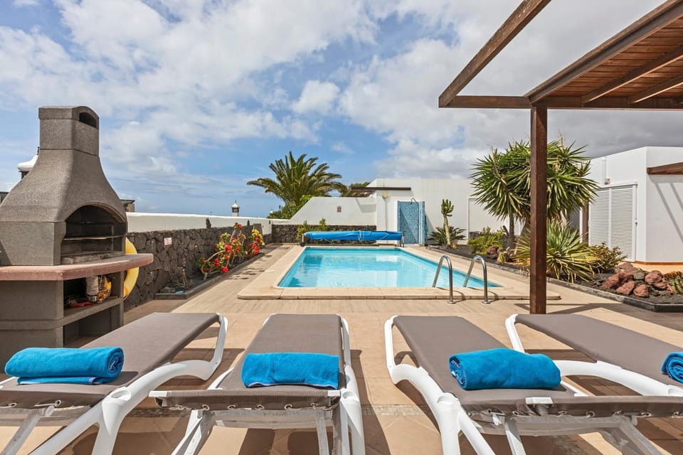 Property building, Living room, Swimming pool