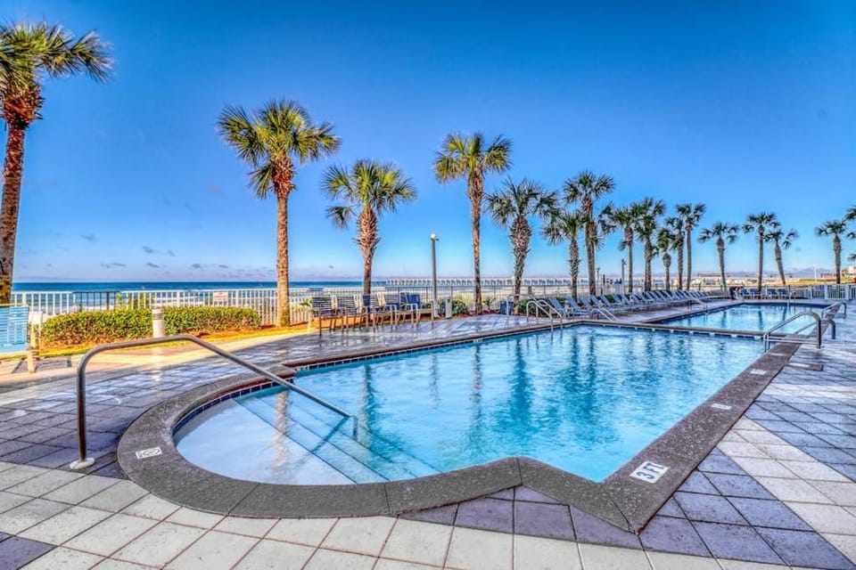 Waterfront condo with grills pool & fitness center - walk to the beach House in Panama City Beach