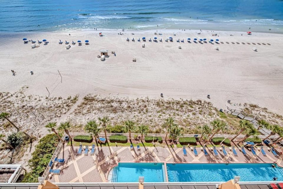 Tropical-themed condo with bi-level pool fitness center & beach access House in Panama City Beach