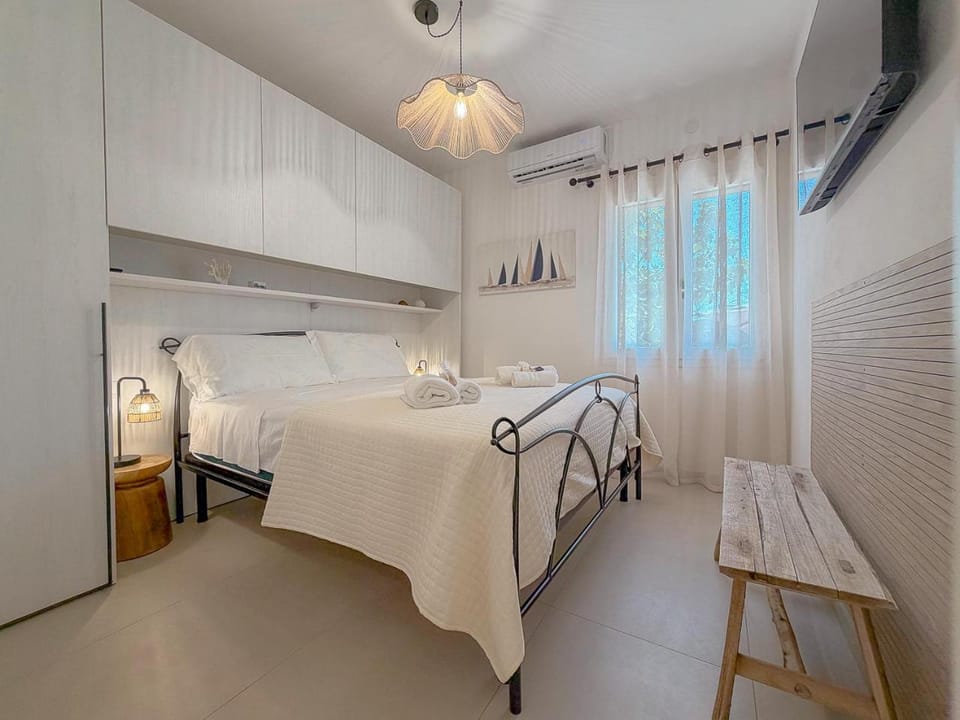 NUOVO - Pergola con BBQ - 2 Camere - Stintino by Host Hero Apartment in Stintino