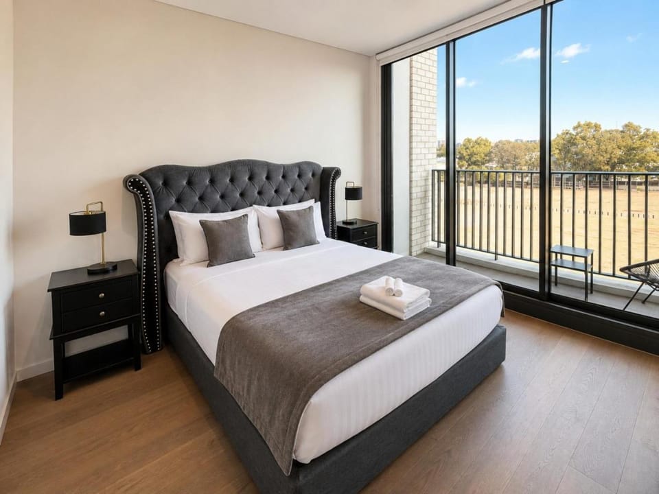 Spacious Pool Retreat with Gym Pool BBQ Rooftop Apartment in Lidcombe
