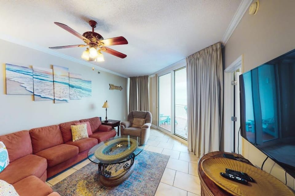 Coastal condo steps to beach with pools hot tub gym & amazing views House in Perdido Key