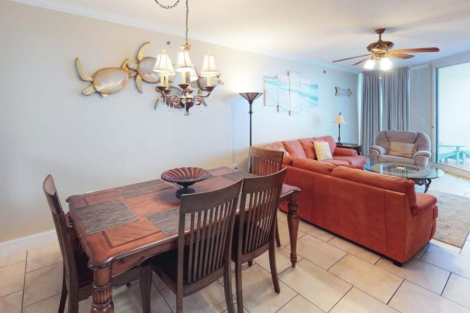 Coastal condo steps to beach with pools hot tub gym & amazing views House in Perdido Key