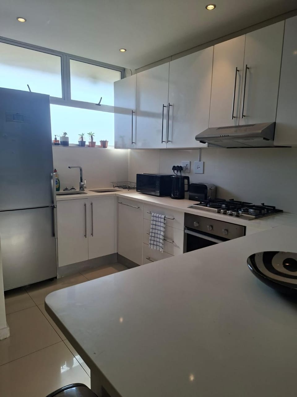 Kitchen or kitchenette, oven, toaster